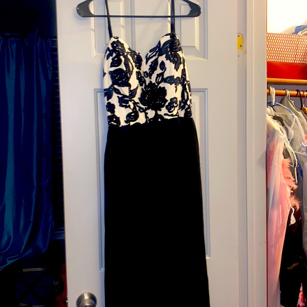 black romper with a train